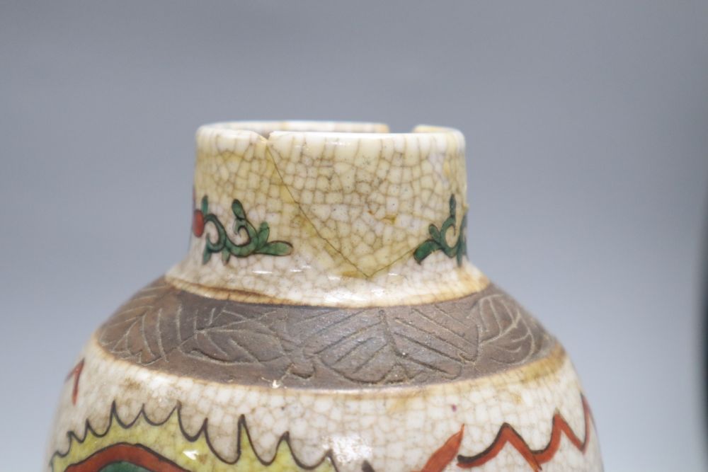 A Chinese famille rose crackleglaze vase and cover, together with a Chinese blue and white figural vase bearing Kangxi mark,